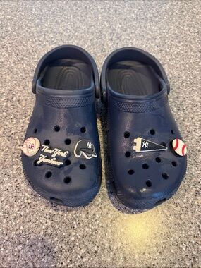 Navy Kids Crocs with NY Yankees Jibbitz.